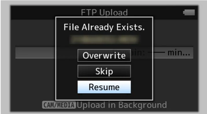 JVC GY-HC900 File Already Exists dialog with overwrite skip and resume choices