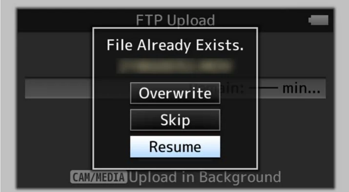 JVC GY-HM660 File Already Exists dialog with overwrite skip and resume choices