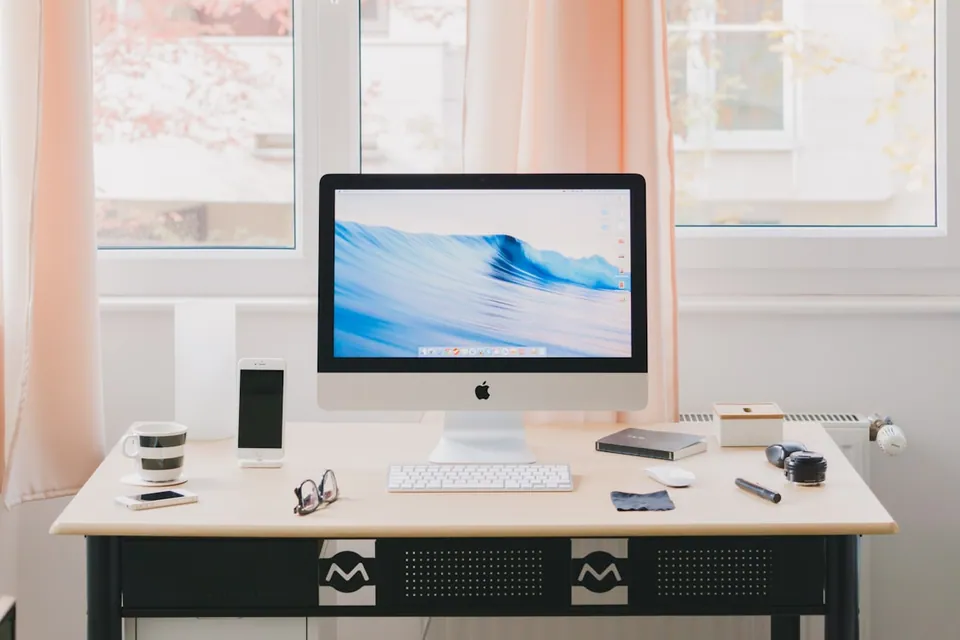 Desk with a large monitor