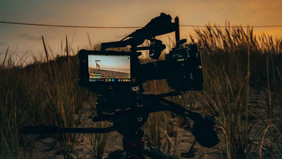 Video camera on a tripod outdoors
